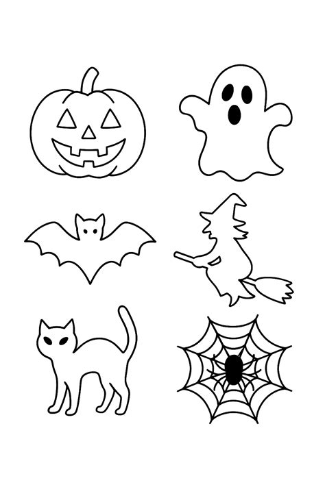 Halloweenska výzdoba s tekvicami a pavučinami
